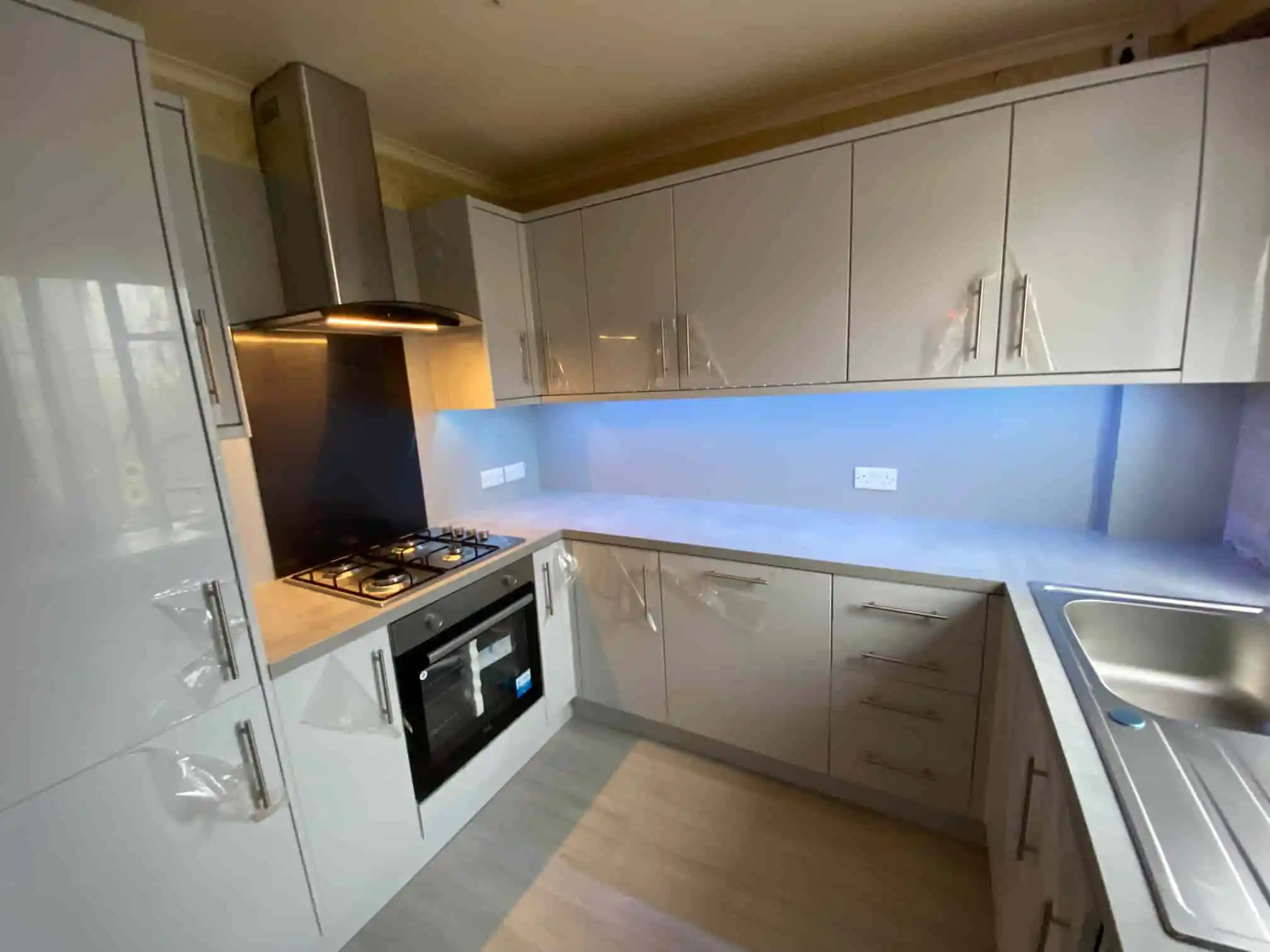 Walnut and stone kitchen by Rena Interiors, Grangemouth
